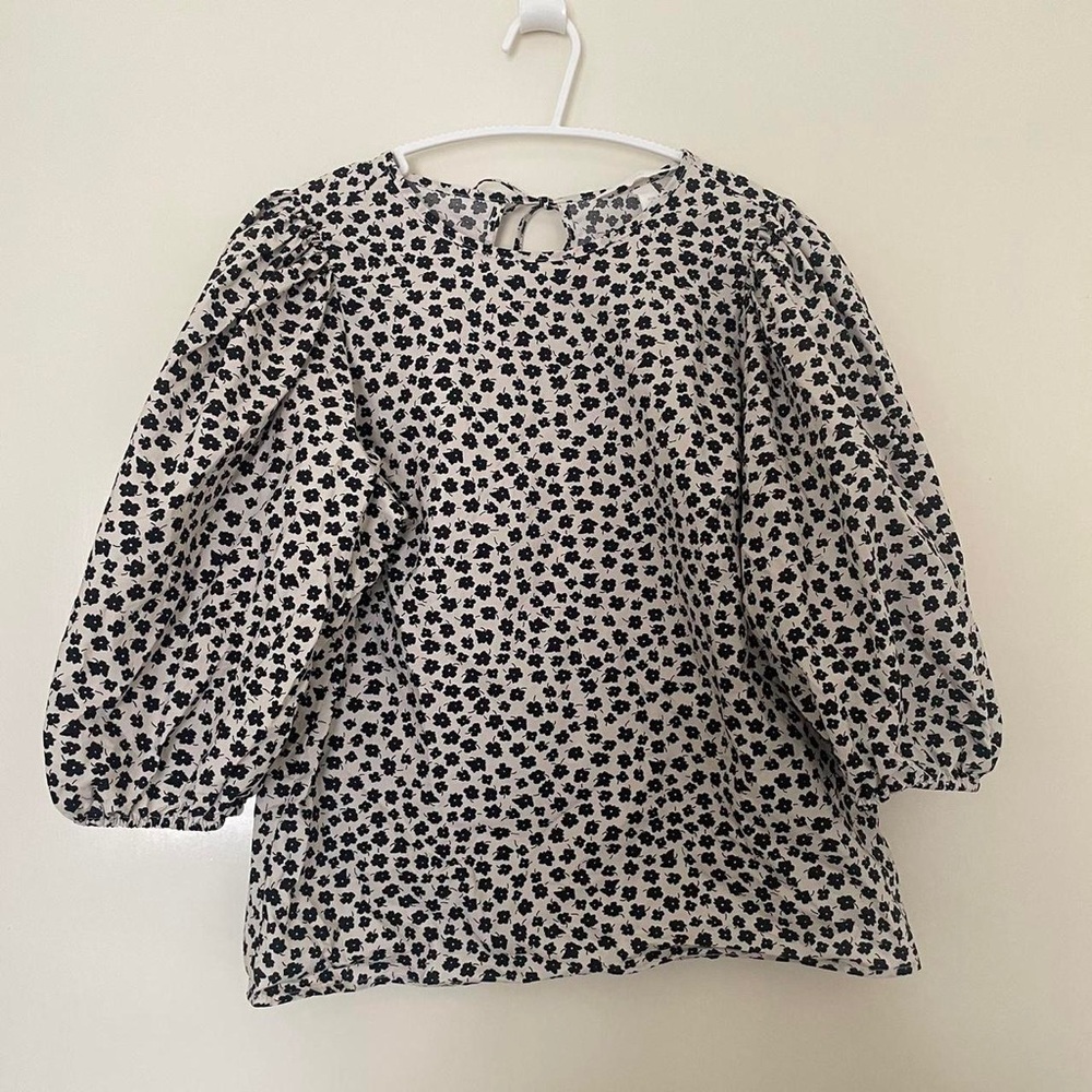 Women’s flower blouse perfect for the holidays
